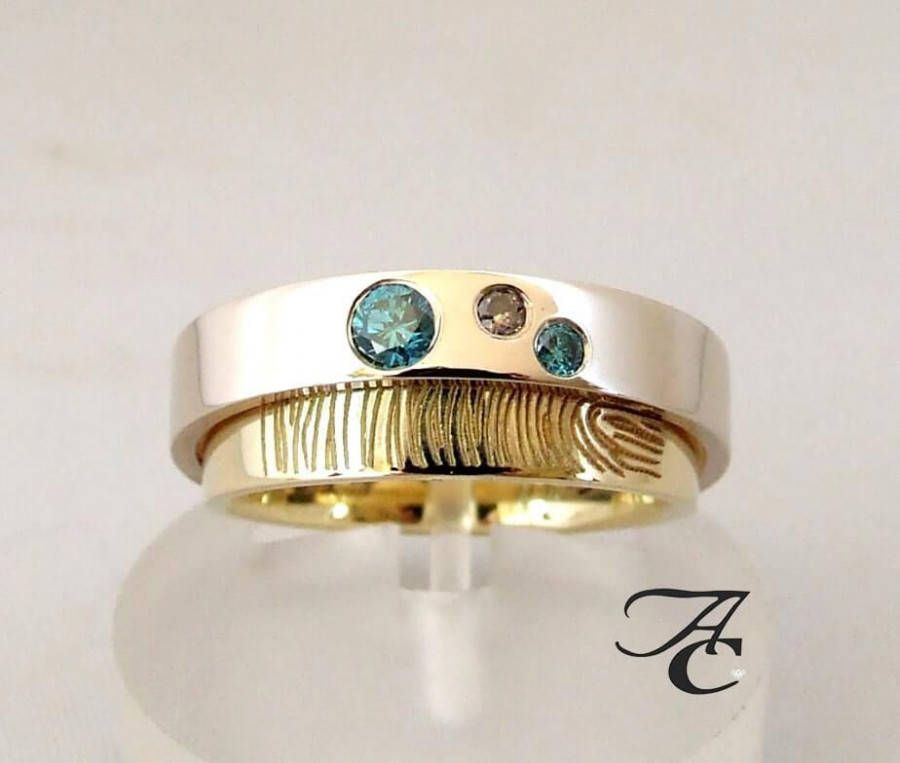 Atelier Christian Vingerprint trouwring met blauwe en bruine diamant