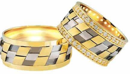 Christian Bicolor trouwringen 0.74 ct. diamanten