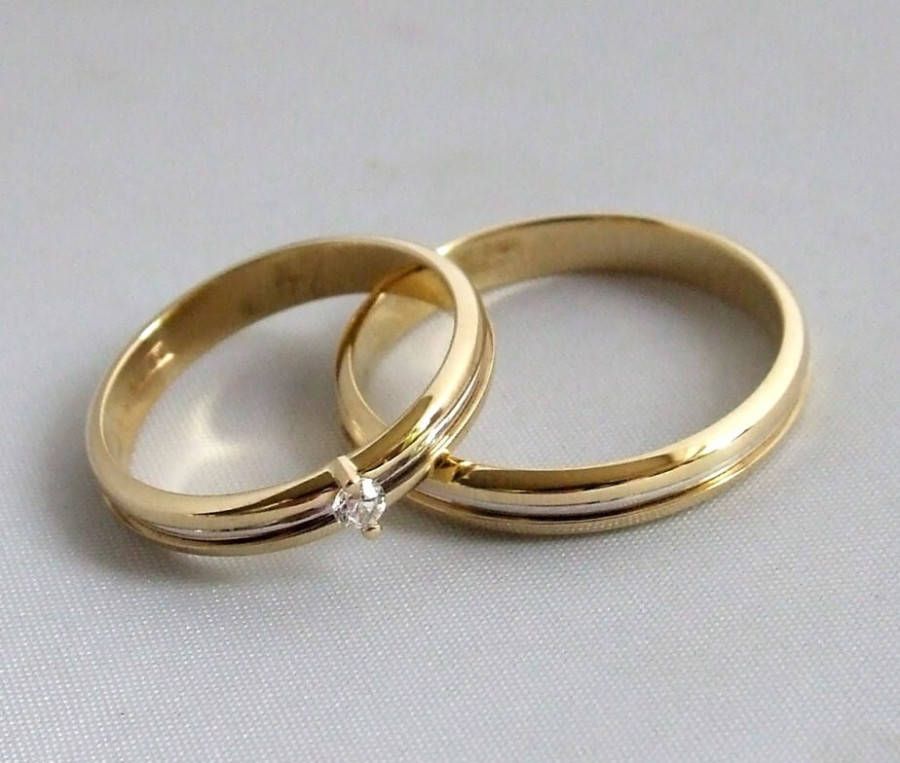 Christian Gouden bicolor trouwringen met diamant