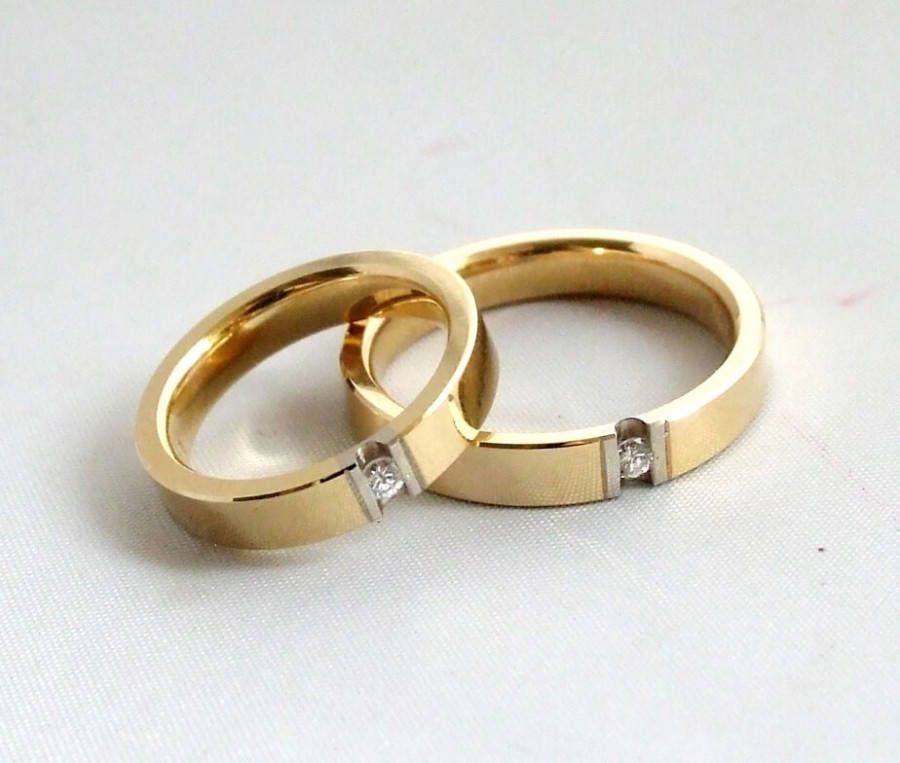 Christian Gouden trouwringen met diamanten