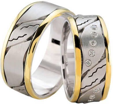 Christian Trouwringen bicolor diagonaal diamanten