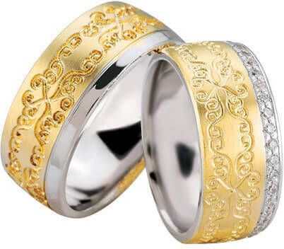 Christian Trouwringen met bloemversiering en diamanten